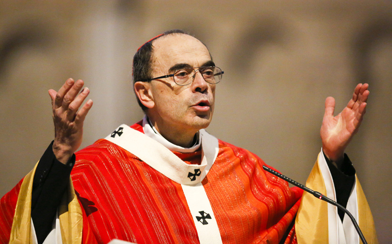 French Cardinal Philippe Barbarin celebrates Good Friday Mass March 25 at the cathedral in Lyon. (CNS/Robert Pratta, Reuters)