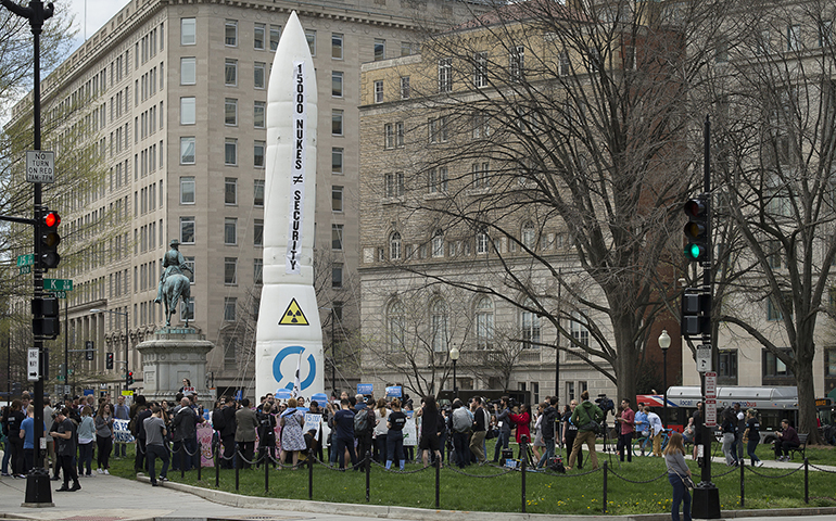 Demonstrators in Washington gather around an inflatable nuke to protest nuclear weapons while world leaders were in the U.S. capital for the Nuclear Security Summit. (CNS/Tyler Orsburn)