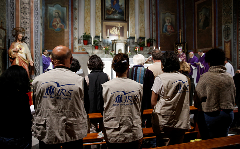Jesuit Refugee Service volunteers attend Mass April 15 at Assumption of the Blessed Virgin Mary Church in Mytilene, Greece (CNS/Alkis Konstantinidis, Reuters)
