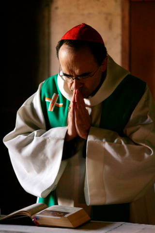 French Cardinal Philippe Barbarin, who is under judicial investigation over sexual abuse accusations against clergy, admitted making mistakes and unveiled new anti-abuse measures at a meeting with local clergy. He is pictured in a 2007 photo. (CNS photo/Mohamed Messare, EPA)