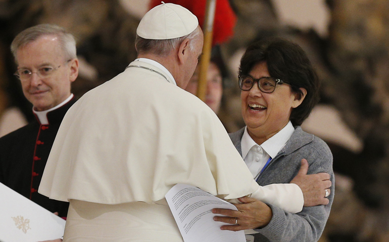 Pope Francis embraces Sr. Carmen Sammut in Paul VI hall at the Vatican May 12. (CNS/Paul Haring)