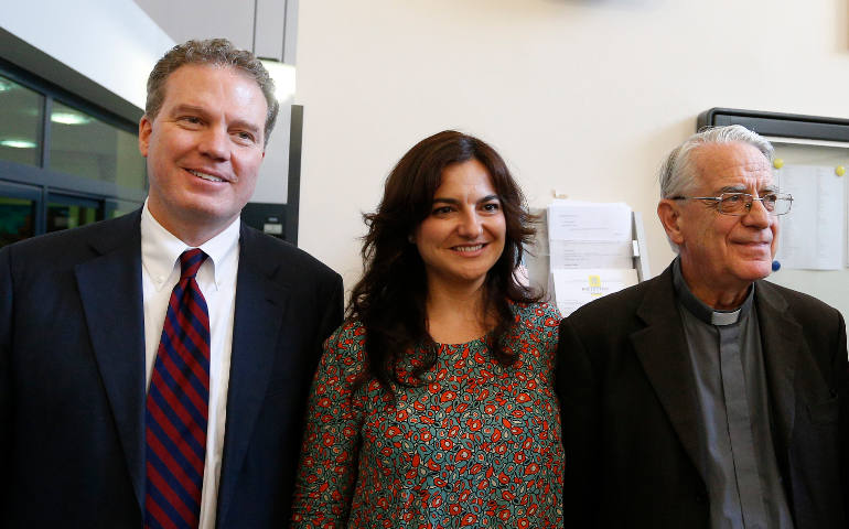 Greg Burke, the new director of the Vatican press office and Vatican spokesman, and Paloma Garcia Ovejero, the new vice director, are pictured with Jesuit Father Federico Lombardi, the outgoing Vatican spokesman, during an announcement of their appointments at an informal meeting with journalists at the Vatican press office July 11. (CNS photo/Paul Haring)