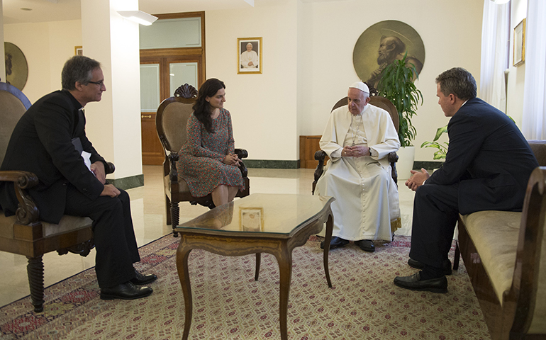 Pope Francis talks with Paloma Garcia Ovejero and Greg Burke, right, at the Vatican July 11, 2016. Also pictured is Msgr. Dario Vigano. (CNS photo/L'Osservatore Romano, handout)