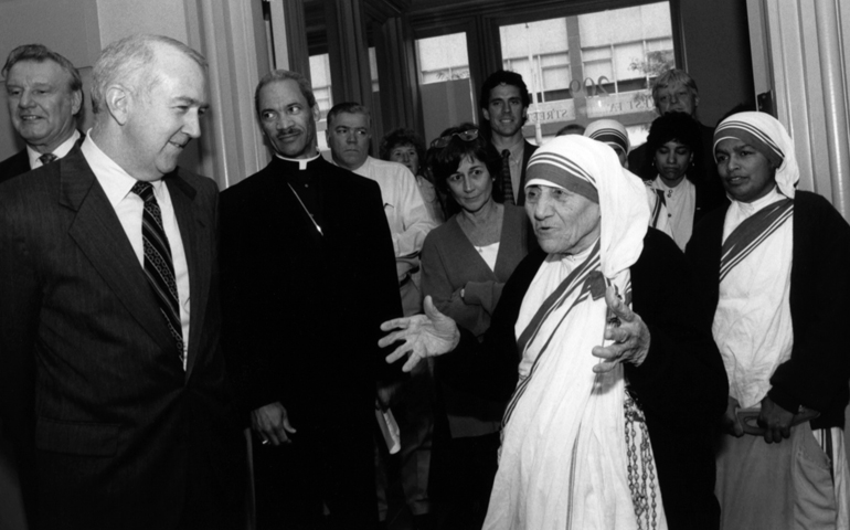 Blessed Teresa of Kolkata talks with Ken Hackett, left, U.S. ambassador to the Holy See and former president of Catholic Relief Services in Baltimore, Md., in a 1996 file photo (CNS/courtesy Catholic Relief Services)