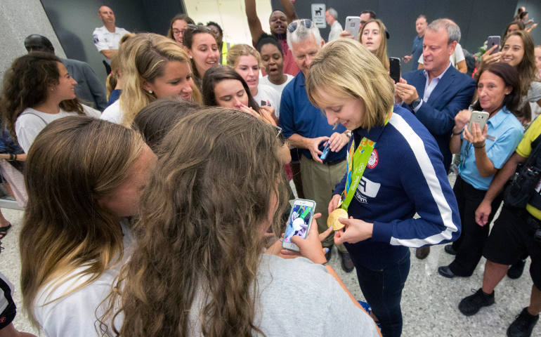 U.S. Olympic swimmer Katie Ledecky greets fans at Dulles International Airport in Virginia Aug. 17, after returning home from the Summer Games in Rio de Janeiro. (CNS photo/Jaclyn Lippelmann, Catholic Standard)