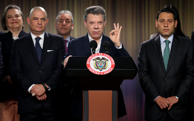 Colombian President Juan Manuel Santos gestures as he speaks Aug. 30 at the Palacio de Narino in Bogota (CNS/Leonardo Munoz, EPA)