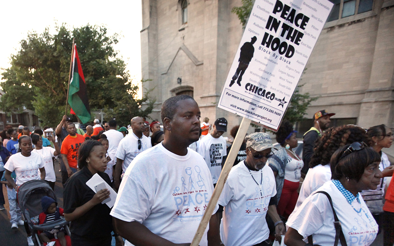 Participants walk during a call for an end to violence in their community June 17 in Chicago. (CNS/Karen Callaway, Catholic New World) 