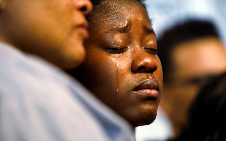 Alfred Olango's daughter at a Sept. 28 news conference held by Olango's family a day after Olango was shot to death. (CNS/Patrick T. Fallon, Reuters)