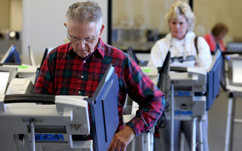 Voters cast ballots in Cleveland as early absentee voting began Oct. 12 ahead of the Nov. 8 U.S. presidential election. (CNS/Aaron Josefczyk, Reuters)