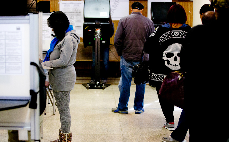 People wait in line to vote in the John Bailey Room at St. Francis Xavier Church in Washington Nov. 8. (CNS/Tyler Orsburn)