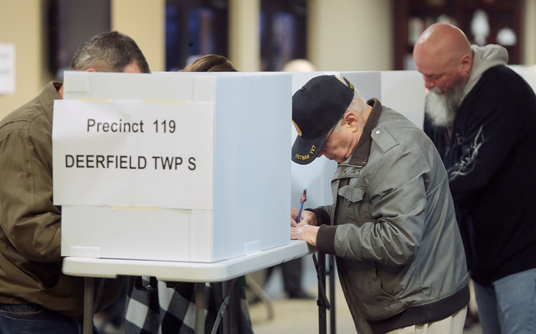 Voters cast their ballots during the presidential election Nov. 8 at a church in Deerfield Township, Ohio. (CNS/Mark Lyons, EPA)