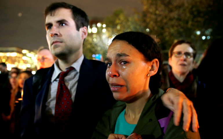 A woman cries while taking part in an anti-Trump vigil in front of the White House in Washington Nov. 9. (CNS/Kevin Lamarque, Reuters)