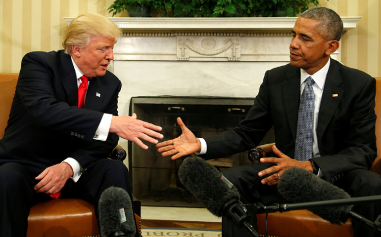 President-elect Donald Trump shakes hands with President Barack Obama during a Nov. 10 meeting in the Oval Office of the White House in Washington. (CNS/Reuters/Kevin Lamarque)
