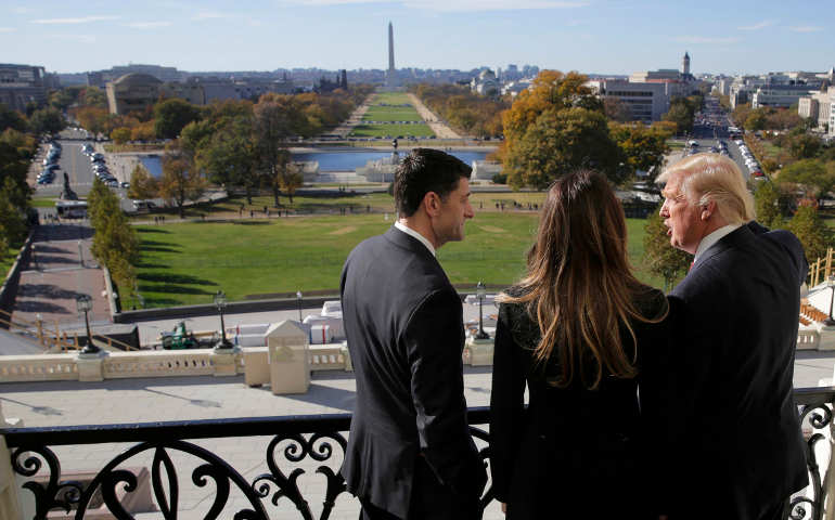 U.S. House Speaker Paul Ryan with Melania Trump and and then President-elect Donald Trump look out on Capitol Hill Nov. 10. (CNS/Reuters)