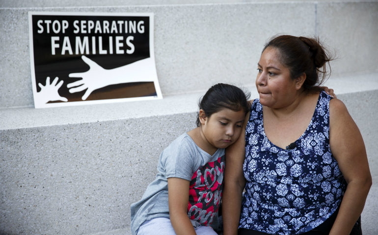 An immigrant mother and daughter are seen in Los Angeles June 23. (CNS/Eugene Garcia, EPA) 