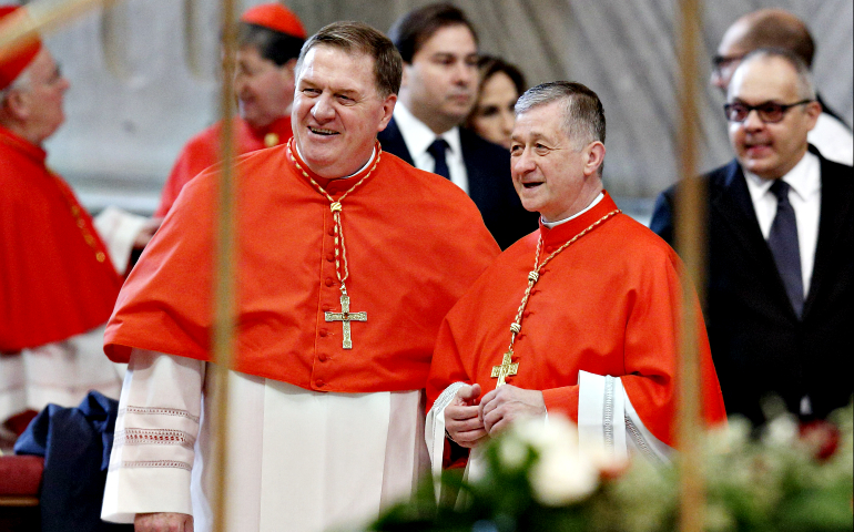 New Cardinals Joseph Tobin of Indianapolis and Blase Cupich of Chicago arrive for a consistory led by Pope Francis in St. Peter's Basilica at the Vatican Nov. 19. (CNS/Paul Haring)