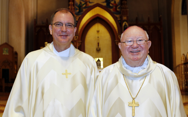 Bishop John O. Barres, left, of Allentown, Pa., and Bishop William F. Murphy of Rockville Centre, N.Y., pose for a photo after concelebrating Mass Dec. 9 at St. Agnes Cathedral in Rockville Centre. Earlier in the day Pope Francis accepted the resignation of Bishop Murphy and appointed Bishop Barres as his successor. (CNS photo/Gregory A. Shemitz, Long Island Catholic)