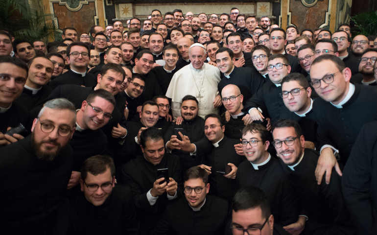 Pope Francis poses with seminarians from the Puglia region of southern Italy. (CNS/L'Osservatore Romano)