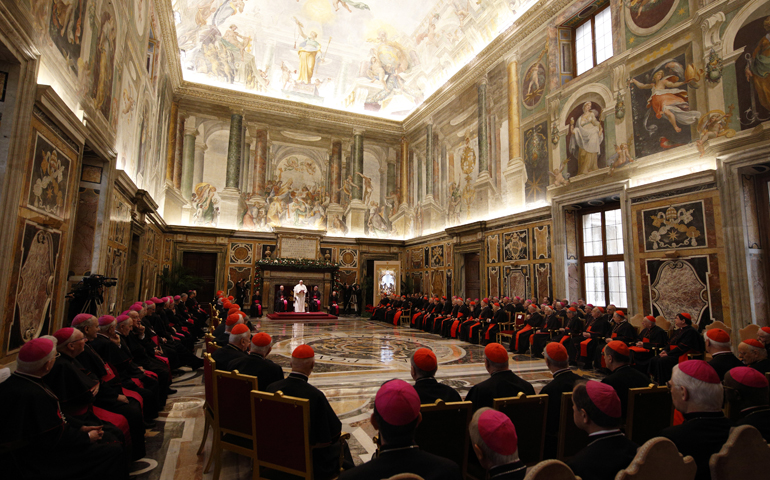 Pope Francis speaks during an audience to exchange Christmas greetings with members of the Roman Curia Dec. 22 in Clementine Hall of the Apostolic Palace at the Vatican. (CNS/Paul Haring)