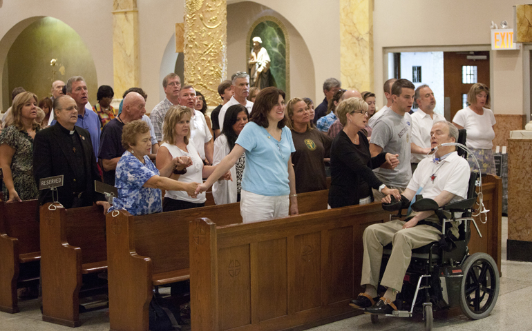 NYPD Detective Steven McDonald, who was paralyzed in the line of duty in 1986, is seen in 2011 during a remembrance ceremony at St. Francis of Assisi church for Franciscan Fr. Mychal Judge. (CNS/Octavio Duran)
