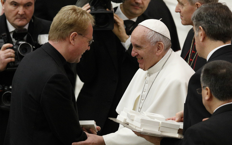 Pope Francis greets Rev. Jens-Martin Kruse of the Evangelical Lutheran Church of Rome during his general audience in Paul VI hall at the Vatican Jan. 18. (CNS photo/Paul Haring)