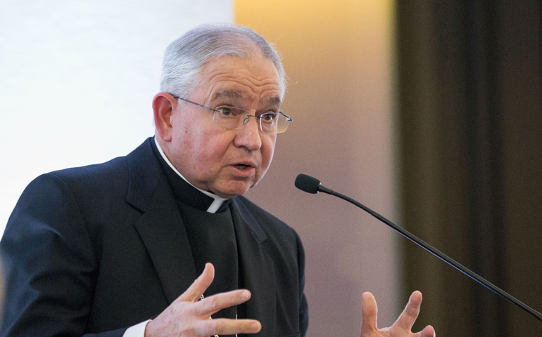 Archbishop José Gomez of Los Angeles gives the closing keynote address Jan. 19 at Vatican-sponsored conference on mass migration and humanitarianism at the University of California in Los Angeles. (CNS/J.D. Long-Garcia, The Tidings)