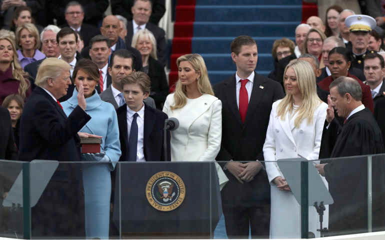 President Donald Trump takes the oath of office Jan. 20. (CNS photo/Carlos Barria, Reuters)