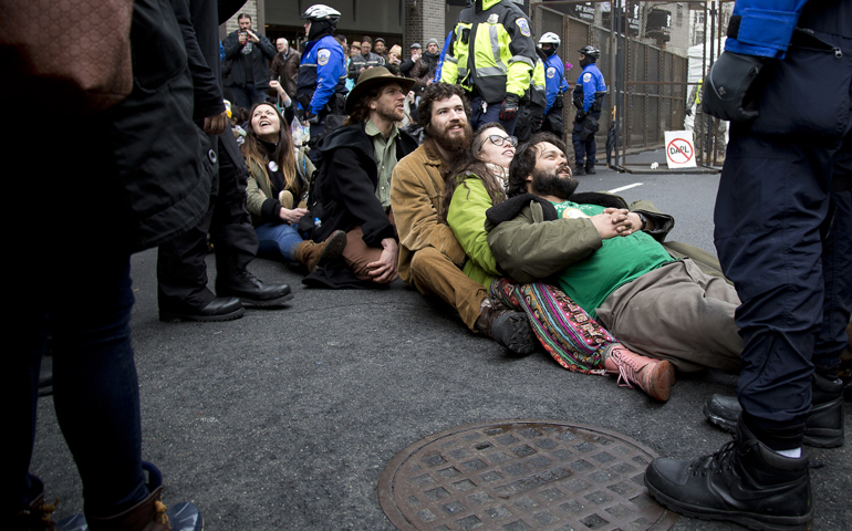 Environmental protesters engage police in Washington prior to the start of U.S. President Donald Trump's swearing-in as the country's 45th president at the U.S. Capitol Jan. 20. (CNS/Tyler Orsburn)