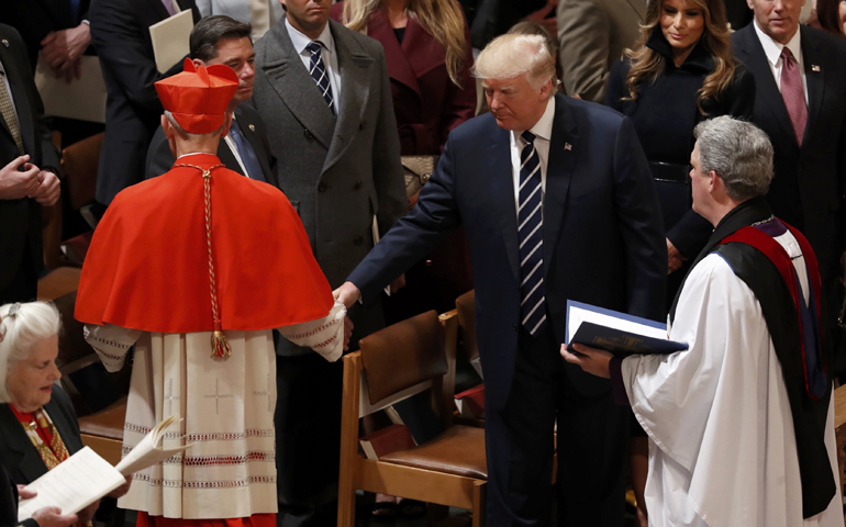 U.S. President Donald Trump greets Cardinal Donald Wuerl during an interfaith prayer service at the National Cathedral in Washington Jan. 21. (CNS/Kevin Lamarque, Reuters)