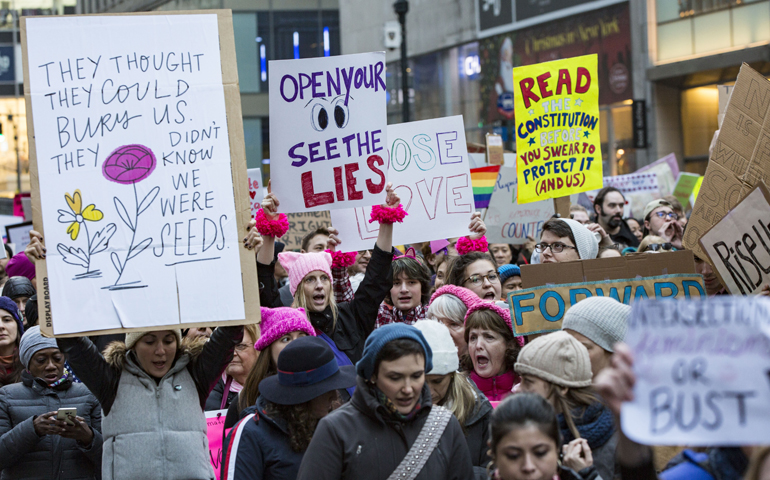 Participants carry signs during the Women's March on New York City Jan. 21. (CNS/Octavio Duran)