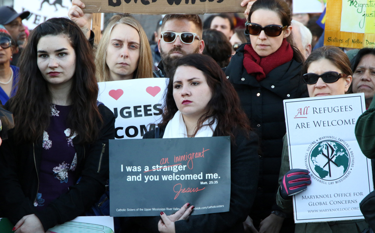 People protest against President Donald Trump's immigration policies during a demonstration near the White House in Washington Jan. 25. (CNS/Gregory A. Shemitz)