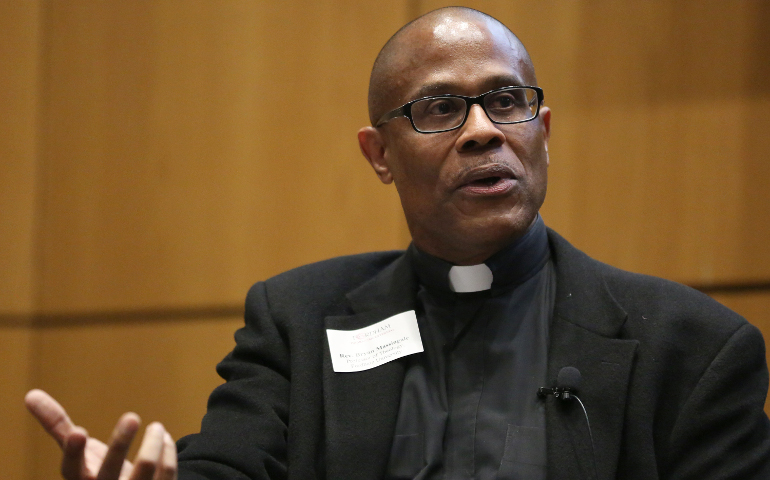 Fr. Bryan Massingale, a theology professor at Fordham University in New York City, speaks during a Jan. 26 panel discussion in New York. (CNS / Bruce Gilbert, Fordham University) 