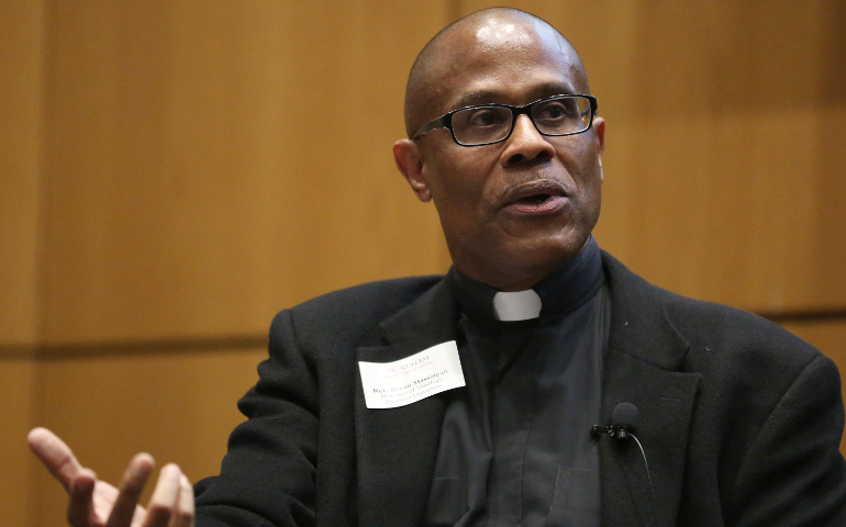 Fr. Bryan Massingale, a theology professor at Fordham University in New York City, speaks during a Jan. 26 panel discussion in New York. (CNS / Bruce Gilbert, Fordham University)