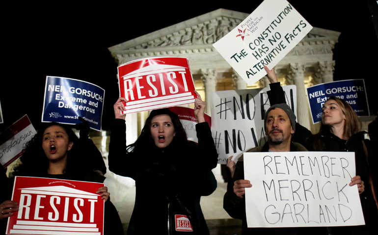 Protesters rally outside the Supreme Court in Washington Jan. 31 against President Donald Trump's Supreme Court nominee Judge Neil Gorsuch. (CNS/Yuri Gripas, Reuters)