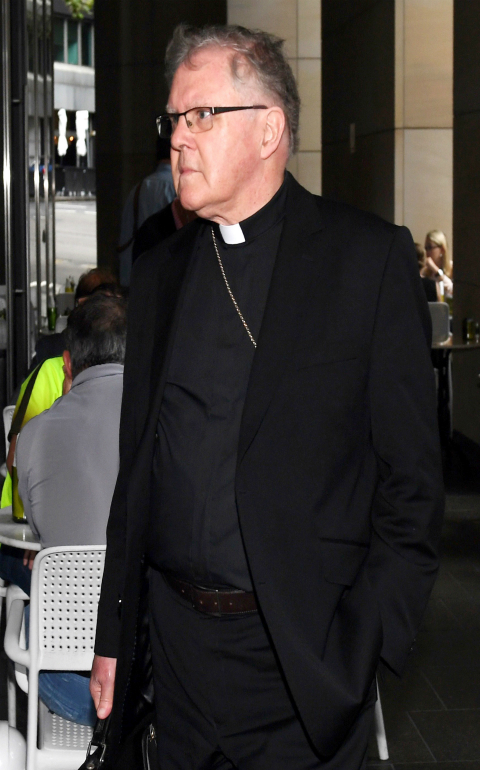 Archbishop Mark Coleridge of Brisbane, Australia, arrives to give evidence at the Royal Commission into Child Sexual Abuse in Sydney Feb. 8. (CNS photo/Paul Miller, EPA).