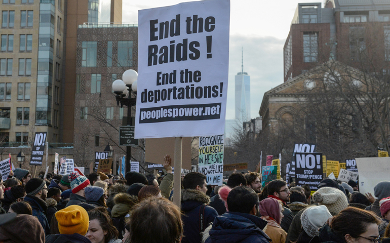 People protest Feb. 11 against President Donald Trump's immigration policy and the recent Immigration and Customs Enforcement raids in New York City. (CNS/Stephanie Keith, Reuters)