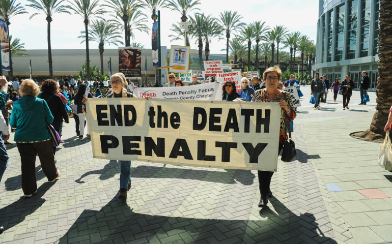 Demonstrators march during a Feb. 25 rally organized by Catholics Against the Death Penalty-Southern California during the four-day 2017 Religious Education Congress in Anaheim, Calif. (CNS/Reuters/Andrew Cullen) 