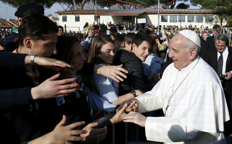 Pope Francis greets people March 12 during a visit at the Rome parish of St. Magdalene of Canossa. (CNS photo/Alessandro Bianchi, Reuters)