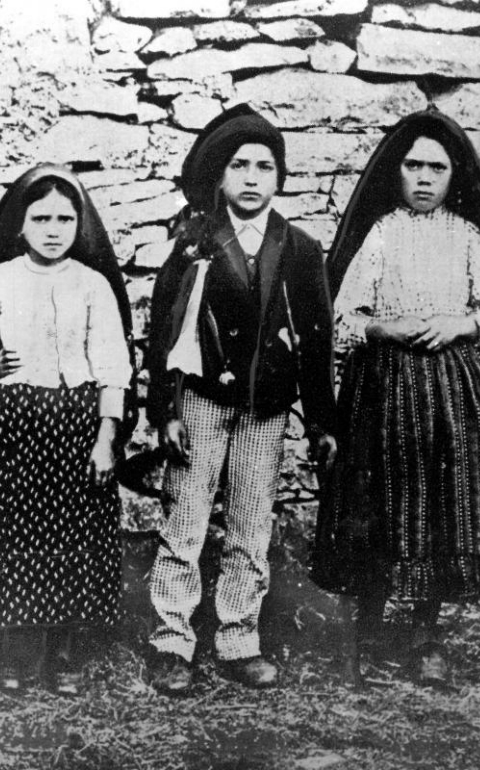 Jacinta and Francisco Marto are pictured with their cousin Lucia dos Santos (right) in a file photo taken around the time of the 1917 apparitions of Mary at Fatima, Portugal. (CNS file photo)