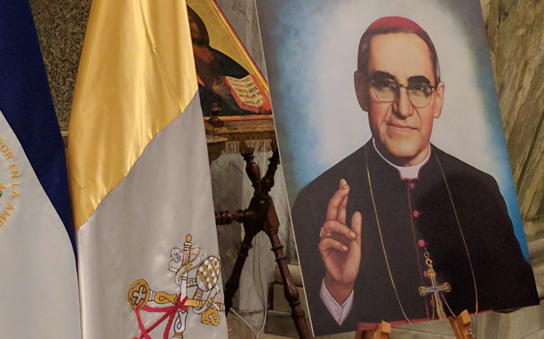 A portrait of Blessed Oscar Romero is displayed March 23 in Rome's Basilica of Santa Maria in Trastevere, where a memorial Mass was celebrated. (CNS photo/Junno Arocho Esteves) 