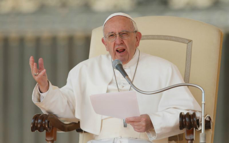 Pope Francis speaks during his general audience in St. Peter's Square at the Vatican April 5. The pope strongly condemned a chemical attack in Syria the previous day that left 70 people dead. (CNS photo/Paul Haring)