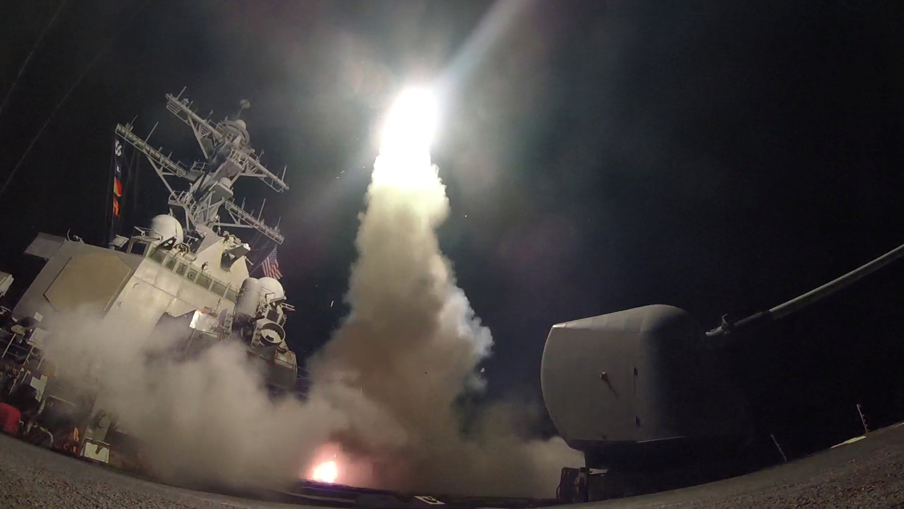 The USS Porter, in the Mediterranean Sea, fires a Tomahawk missile April 7. (CNS/U.S. Navy handout via Reuters)