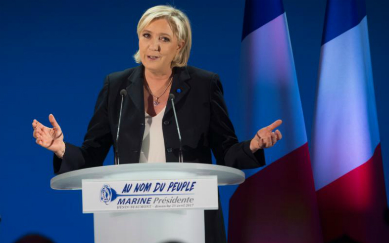 Marine Le Pen, leader of the far-right National Front, delivers a speech in Henin-Beaumont, France, April 23, after the first round of the French presidential elections. (CNS photo/Oliver Hoslet, EPA)