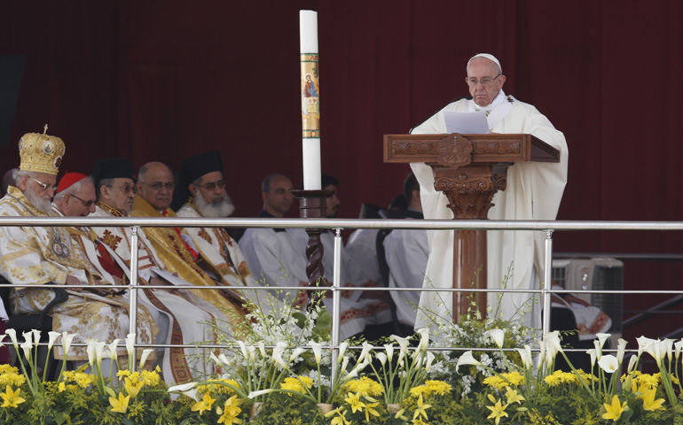 Pope Francis gives the homily as he celebrates Mass at the Air Defense Stadium in Cairo April 29. (CNS/Paul Haring) 