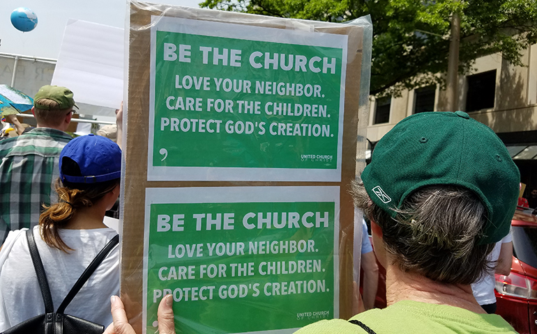 A sign some people carried at the People's Climate March April 29 in Washington (Provided photo)