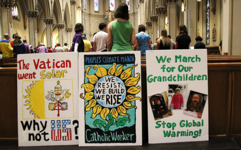 Faithful gather at St. Dominic Church in Washington prior to the start of the People's Climate March April 29. (CNS photo/Dennis Sadowski)