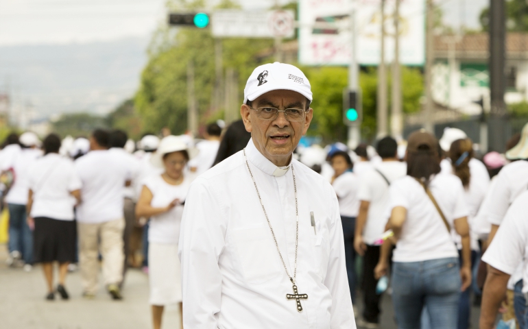 Cardinal-designate Gregorio Rosa Chavez, auxiliary bishop of San Salvador, El Salvador, is seen at a march for peace. (CNS/Octavio Duran) 