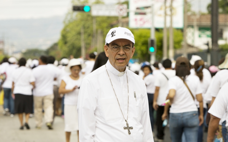 Cardinal-designate Gregorio Rosa Chavez, auxiliary bishop of San Salvador, El Salvador, is seen at a march for peace. (CNS/Octavio Duran)