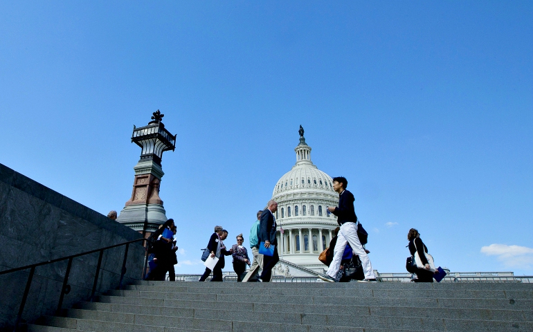 People walk near the U.S. Capitol in Washington May 3. (CNS/Tyler Orsburn)