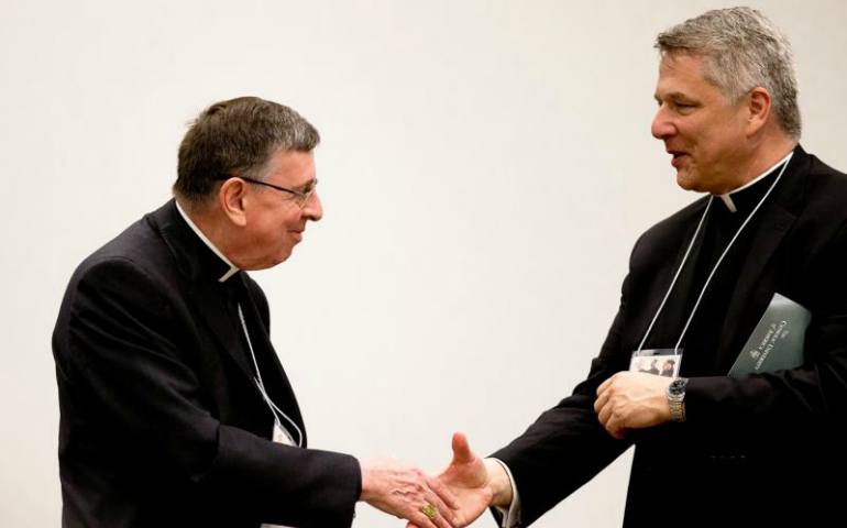 Cardinal Kurt Koch, left, president of the Pontifical Council for Promoting Christian Unity, is seen with Fr. Mark Morozowich, acting provost at The Catholic University of America in Washington, May 30. (CNS/Tyler Orsburn)